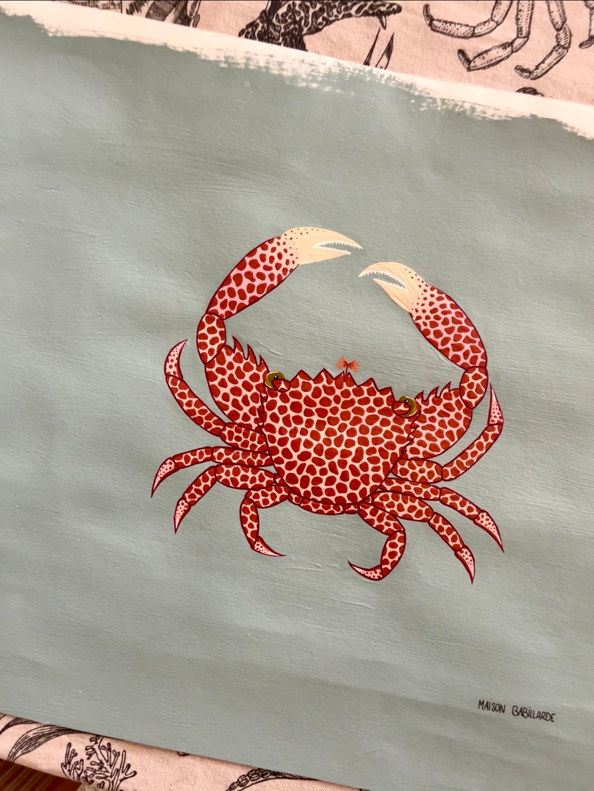Peinture crabe corallicole à pois rouges